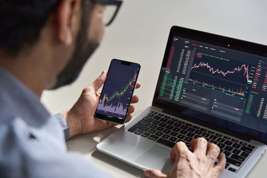 Business Man Trader Investor Analyst Using Mobile Phone App Analytics
